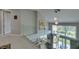 Open loft area overlooking the dining area and backyard views at 7999 Pinnacle Peak Ave, Las Vegas, NV 89113