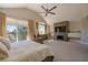 Bright main bedroom with vaulted ceiling, fireplace, and large windows with views at 7999 Pinnacle Peak Ave, Las Vegas, NV 89113