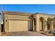 Beautiful home featuring a two-car garage and well-maintained front yard at 8144 Skye Dragon St, Las Vegas, NV 89166