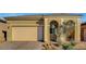 Charming single-story home with a two-car garage and desert landscaping at 8144 Skye Dragon St, Las Vegas, NV 89166