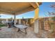 Covered patio with outdoor furniture and hot tub at 8144 Skye Dragon St, Las Vegas, NV 89166