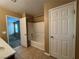 Bathroom featuring shower over tub with tile flooring and vanity sink at 8683 Bella Jewel Ave, Las Vegas, NV 89178