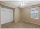 Bedroom with carpeted floors, natural light, and closet space at 8683 Bella Jewel Ave, Las Vegas, NV 89178