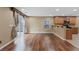 Dining room with wood-style flooring and backyard access at 8683 Bella Jewel Ave, Las Vegas, NV 89178