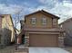 Charming two-story home with a two-car garage, appealing facade, and well-maintained landscaping at 8683 Bella Jewel Ave, Las Vegas, NV 89178