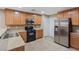 Functional kitchen with stainless steel appliances and ample counter space at 8683 Bella Jewel Ave, Las Vegas, NV 89178