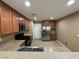 Modern kitchen with stainless steel appliances, plenty of counter space, and tile flooring at 8683 Bella Jewel Ave, Las Vegas, NV 89178