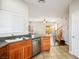 The kitchen has stainless steel appliances and leads into a cozy living area at 9489 Liquid Loco St, Las Vegas, NV 89178