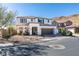 Inviting two-story home with mountain view, a manicured front yard at 9519 Chandler Springs Ave, Las Vegas, NV 89148