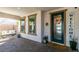 Welcoming front porch with decorative accents and comfortable seating at 9519 Chandler Springs Ave, Las Vegas, NV 89148