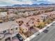 Wide aerial view of a community with neatly arranged homes and desert landscape at 9655 Shadow Cliff Ave, Las Vegas, NV 89166