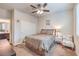 Cozy bedroom featuring a ceiling fan, carpet, and a comfortable bed at 9655 Shadow Cliff Ave, Las Vegas, NV 89166