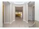 Bright entryway with neutral walls, tiled floor, and seamless transition to living spaces at 967 Buggy Whip Ct, Mesquite, NV 89034