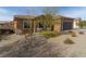 Charming single-story home featuring low-maintenance desert landscaping and a welcoming facade at 967 Buggy Whip Ct, Mesquite, NV 89034