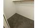 A small walk-in closet featuring carpeted floor and clothes rack at 10047 Fine Fern St, Las Vegas, NV 89183