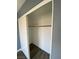 Bedroom closet featuring laminated wood floor and sliding doors at 10047 Fine Fern St, Las Vegas, NV 89183