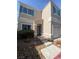 Charming two-story home featuring light stucco, teal shutters, and a one-car garage at 10047 Fine Fern St, Las Vegas, NV 89183