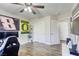 Game themed bedroom featuring closet space, ceiling fan, and comfortable lighting at 1099 Sheer Paradise Ln # 1, Henderson, NV 89002