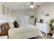 Comfortable bedroom with a well-made bed, a view to the outside, and modern decor at 1099 Sheer Paradise Ln # 1, Henderson, NV 89002