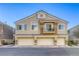 Charming townhome featuring a three-car garage and second story balcony at 1099 Sheer Paradise Ln # 1, Henderson, NV 89002