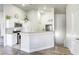 Bright kitchen with stainless steel appliances, a functional breakfast bar, and an open layout at 1099 Sheer Paradise Ln # 1, Henderson, NV 89002