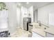 Well-lit kitchen featuring stainless steel appliances, stylish backsplash, and a functional layout at 1099 Sheer Paradise Ln # 1, Henderson, NV 89002