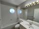 Bathroom featuring a tub, toilet, and vanity sink at 11009 Royal Highlands St, Las Vegas, NV 89141