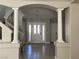 Inviting foyer with high ceilings, neutral colors, and tiled flooring at 11009 Royal Highlands St, Las Vegas, NV 89141