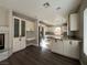 Well-lit kitchen with stainless steel appliances, granite countertops, and ample cabinet space at 11009 Royal Highlands St, Las Vegas, NV 89141