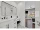 Stylish bathroom with a sleek vanity, modern fixtures, and a view of the bedroom at 1320 Enchanted River Dr, Henderson, NV 89012
