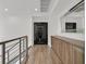 Hallway featuring a custom Fort Knox door and built in storage at 1320 Enchanted River Dr, Henderson, NV 89012