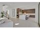 Open kitchen with stainless steel appliances, a large island, and modern finishes at 1320 Enchanted River Dr, Henderson, NV 89012