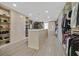 Luxurious walk-in closet with custom shelving, drawers, and plenty of space for clothes and shoes at 1320 Enchanted River Dr, Henderson, NV 89012