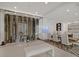 Glass-enclosed wine storage near dining area, showcasing elegant design and ample wine capacity at 1320 Enchanted River Dr, Henderson, NV 89012