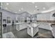 Spacious kitchen features two islands, stainless steel appliances, and white cabinetry at 177 Knollwood Ct, Henderson, NV 89074