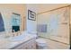 Bathroom featuring marble countertop, a vanity, and a shower with sliding glass doors at 1831 Rosemere Ct, Las Vegas, NV 89117