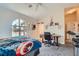 Bedroom features a large window and carpeted floors at 1831 Rosemere Ct, Las Vegas, NV 89117