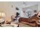 Bedroom features a ceiling fan, a large window, and traditional furnishings at 1831 Rosemere Ct, Las Vegas, NV 89117