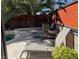 Cozy backyard pool area with lounge chairs and beautiful landscaping, creating a tranquil outdoor retreat at 1913 April Mist St, Henderson, NV 89002