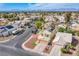 Charming two-story home with a pool and beautiful landscaping in a desirable neighborhood with city views at 1933 Orchard Valley Dr, Las Vegas, NV 89142
