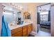 This bathroom features a double vanity, ample storage space, and updated fixtures at 1933 Orchard Valley Dr, Las Vegas, NV 89142