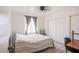 Bright bedroom with neutral walls, wood floors, and a closet at 1933 Orchard Valley Dr, Las Vegas, NV 89142
