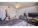 Spacious bedroom with ceiling fan, neutral walls, and a large closet at 1933 Orchard Valley Dr, Las Vegas, NV 89142