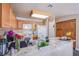 Well-equipped kitchen featuring granite countertops and light wood cabinets at 1933 Orchard Valley Dr, Las Vegas, NV 89142