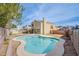 Backyard features a private pool, patio, shed, and desert landscaping at 1933 Orchard Valley Dr, Las Vegas, NV 89142