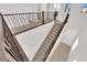 View of the staircase with modern railing and bright natural light at 2865 Victorian Rd, North Las Vegas, NV 89086