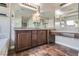Bathroom featuring large vanity with granite countertop and tile flooring at 336 S Milan St, Henderson, NV 89015