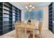Bright dining room features large windows and built-in shelving for ample storage and display at 336 S Milan St, Henderson, NV 89015