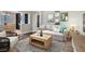 Inviting living room features modern decor and natural light, creating a cozy atmosphere at 336 S Milan St, Henderson, NV 89015
