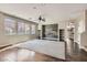 Spacious living room with decorative wood wall, shelves and large windows at 336 S Milan St, Henderson, NV 89015